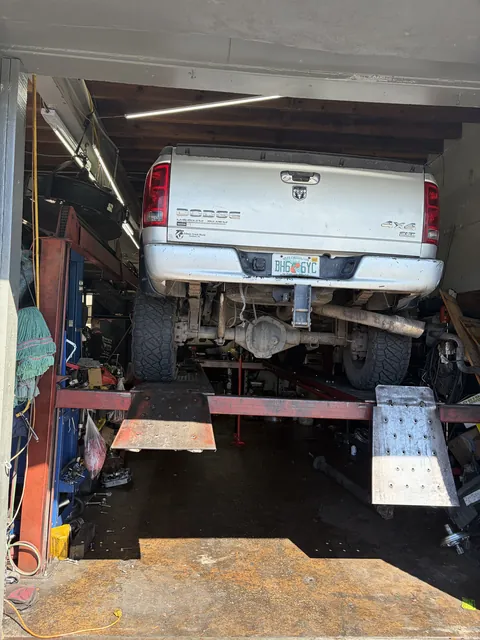 Pickup truck on the lift with the rear driveline exposed